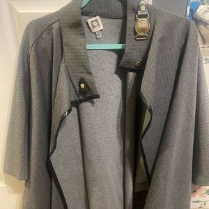Unique poncho very few times almost new can be wear in winter and fall